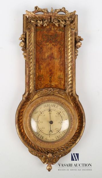 null Barometer in wood and gilded stucco decorated with a frieze of piastres, it...