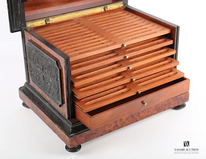 null Cigar box in burr wood and blackened wood veneer, the lid with a crack revealing...