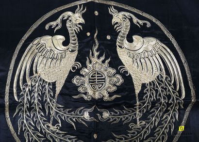 null CHINA

Two embroideries on silk presenting dragons in medallions 

One bearing...