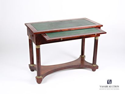 null Writing table in mahogany veneer, the rectangular tray is darkened with a green...