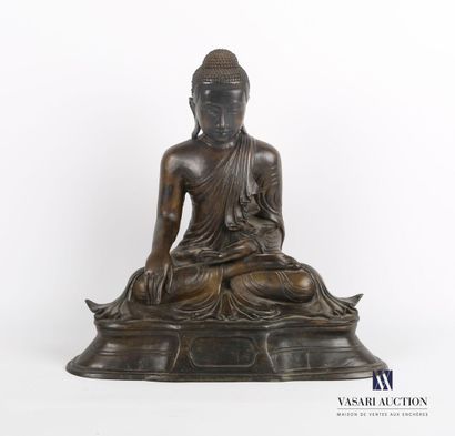 null NEPAL

Seated Buddha in meditation position on a lotiform base, making the sign...
