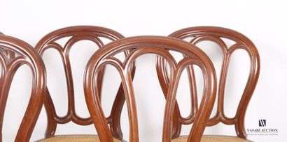 null Suite of five chairs in molded natural wood, the back balloon openwork of three...