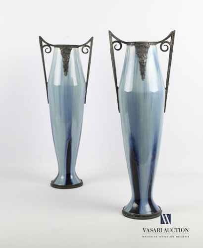 null Pair of large oblong vases decorated with drips in shades of blue, the hammered...