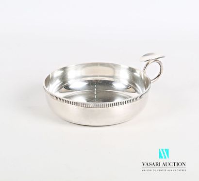 null Cup in the shape of taste wine out of silver plated metal posing on a flat bottom,...