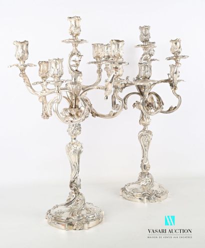 null Pair of candelabras with seven lights in silvered bronze, it rests on a round...