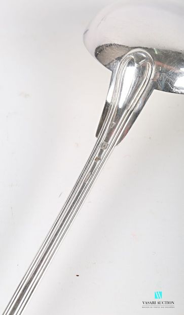 null Ladle out of silver plated metal the handle decorated with nets, quantified.

Goldsmith...