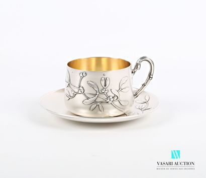 null Chocolate cup and its saucer in silver decorated with branches of mistletoe...