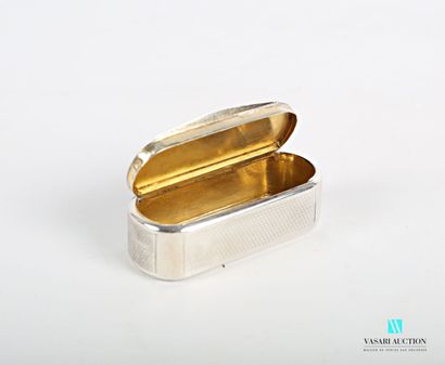 null Silver snuff box of oval form, it opens by a lid with hinge presenting a blind...