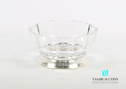 null Glass salad bowl of round form with cut sides, it rests on a round base out...