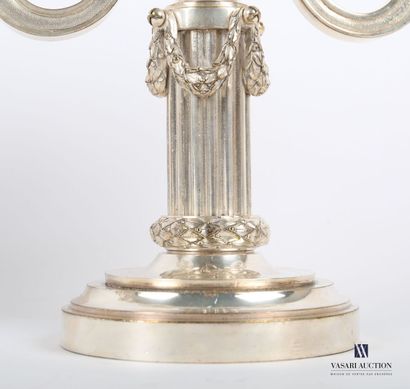 null Pair of silver-plated bronze candlesticks standing on a round base with a doucine,...
