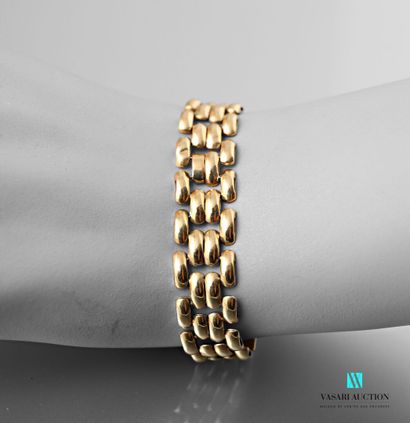 null Bracelet in yellow gold 750 thousandths mesh grain of rice 24.6 g. Length 21...