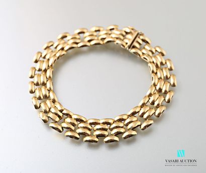 null Bracelet in yellow gold 750 thousandths mesh grain of rice 24.6 g. Length 21...