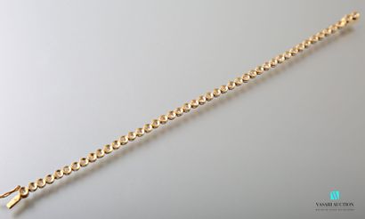 null Bracelet line in yellow gold 750 thousandths decorated with 45 diamonds of approximately...