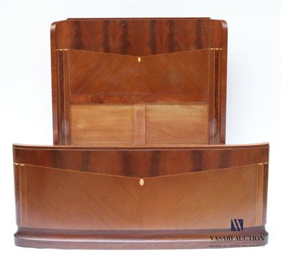 null Natural wood and mahogany veneer bed, the curved headboard with inlaid decoration...