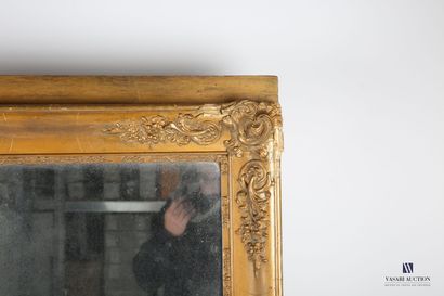 null Wooden mirror and painted stucco, the spandrels decorated with shells and flowery...