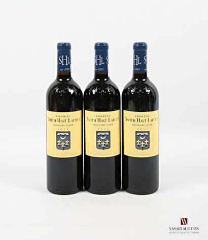 null 3 bottles Château SMITH HAUT LAFITTE Graves GCC 2011
	And. barely stained. N:...
