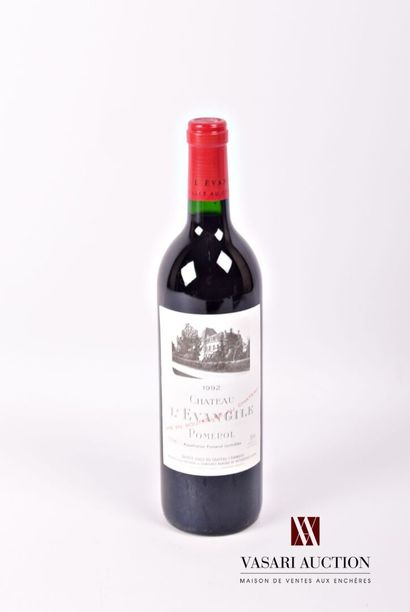 null 1 bouteille	Château L' EVANGILE	Pomerol	1992
	Et. impeccable. N : mi/bas go...