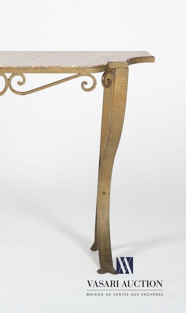 null Console in wrought iron with a golden patina, the dark veined marble top is...