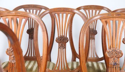 null Suite of nine chairs and an armchair e, molded and carved oak, the oval openwork...