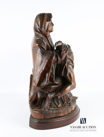 null Vierge de Pitié en bois sculpté, dos évidé. Cette émouvante sculpture de belle...