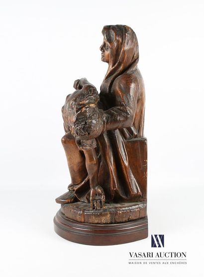 null Virgin of Pity in carved wood, hollowed out back. This moving sculpture of beautiful...