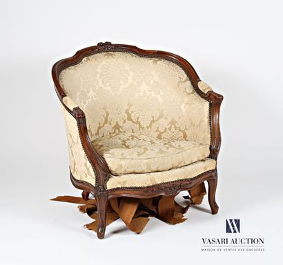 null Shepherd's chair in molded and carved natural wood, the curved backrest topped...