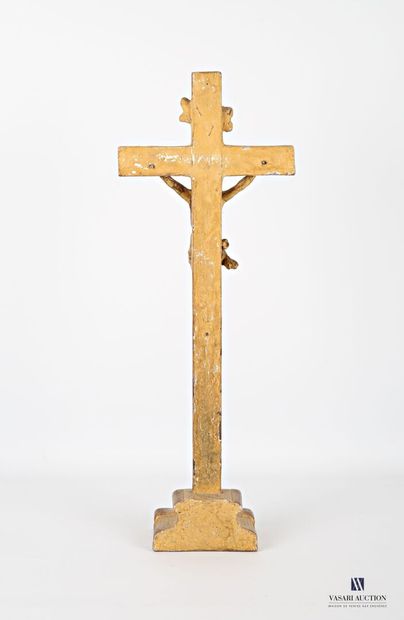 null Christ in carved and gilded wood, the cross with guilloche decoration rests...