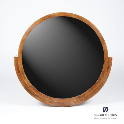 null Important round mirror hemmed with a walnut veneer band and highlighted in its...