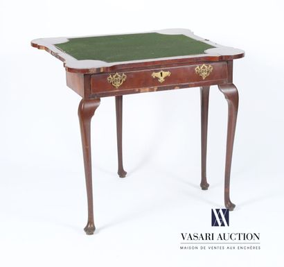 null Mahogany and mahogany veneer game table, the rectangular top with a jutting...