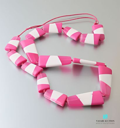 null Long necklace decorated with free patterns in pink and white plastic on cord.
Length...