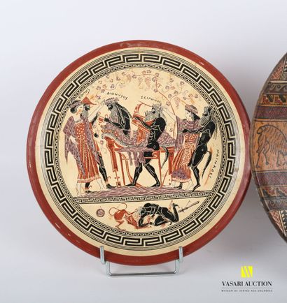 null Lot including a pair of terra cotta plates with printed decoration of banquet...