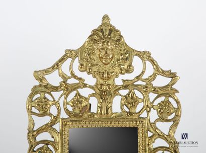 null Small bronze mirror, the rectangular glass hemmed with a frieze of water leaves...