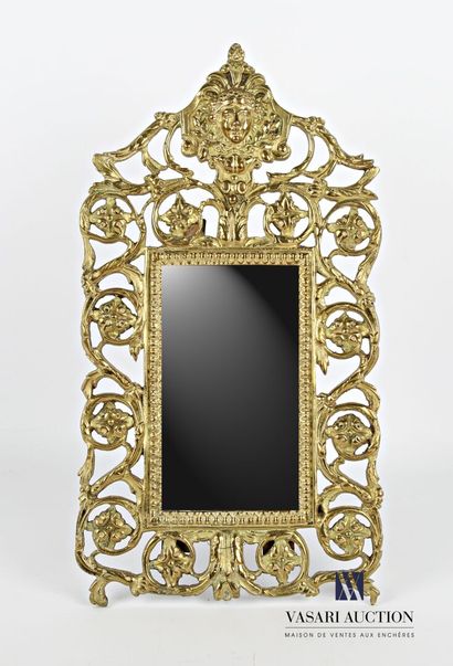 null Small bronze mirror, the rectangular glass hemmed with a frieze of water leaves...