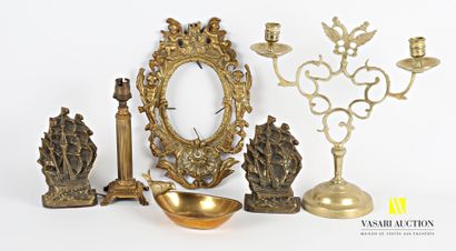 null Lot including a gilded metal cup of shuttle form, the catch in the shape of...