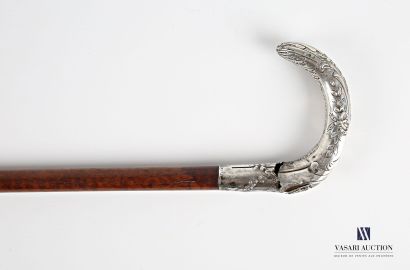 null Cane, the pommel silver stick decorated with branches of flowers, palm and acanthus...