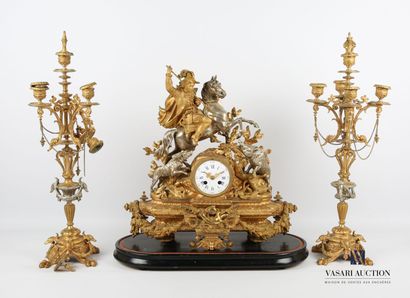 null Regula mantel set with a golden and silver patina, including a clock and a pair...