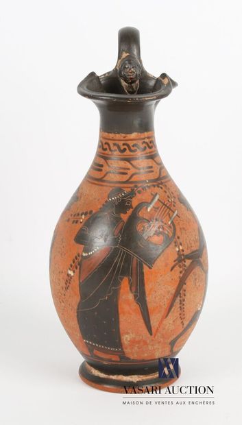 null Oenochoe with three-lobed beak and pear-shaped body in terracotta with black...