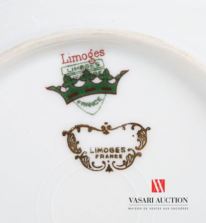 null LIMOGES
Two parts of services in white porcelain, the border hemmed with a red...