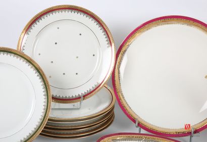 null LIMOGES
Two parts of services in white porcelain, the border hemmed with a red...