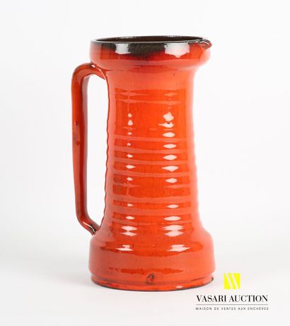 null Ceramic pitcher with orange and brown patina 
(small chips at the base)
Height...