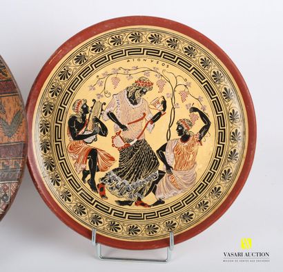 null Lot including a pair of terra cotta plates with printed decoration of banquet...