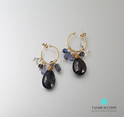 Pair of silver earrings adorned with a faceted...