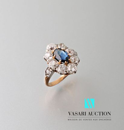 null Ring in pink gold 750 thousandth set with a central oval sapphire surrounded...