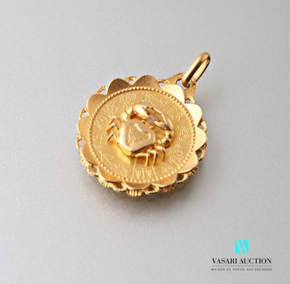 null A. Augis, round pendant in yellow gold 750 thousandths "Cancer", the back signed...