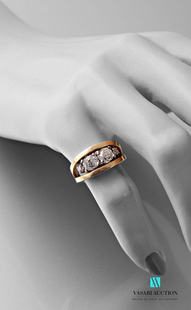 null Ring in yellow gold 750 thousandth, the open center and set with four old cut...