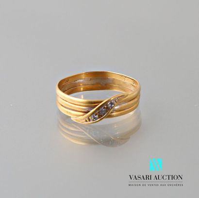 null Ring in yellow gold 750 thousandths formed of three rings half-jonc decorated...