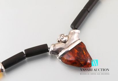 null Necklace made of blackened wood beads, silver and amber finished with a triangular...