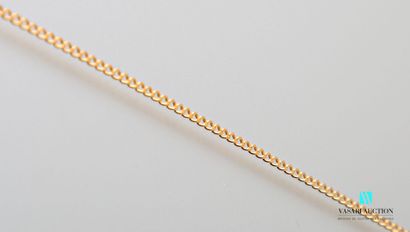 null Chain in yellow gold 750 thousandths mesh gourmette 
Weight : 8,2 g - Length...