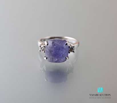 null Ring in white gold 750 thousandths set with a square cabochon tanzanite calibrating...