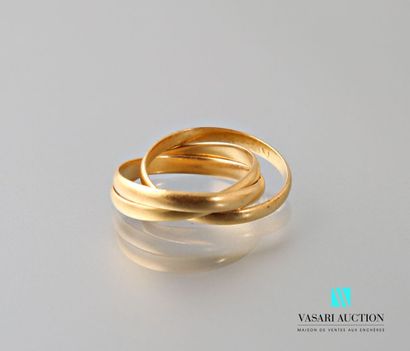 null Three rings linked in yellow gold 750 thousandths 
Weight : 3,8 g - Size 47...